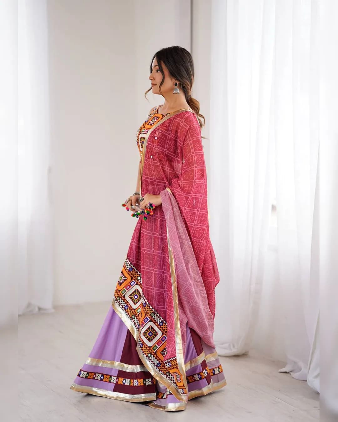 Navratri Special Heavy Rayon Lehenga Choli with Real Mirror & Gamthi Thread Work alternate view